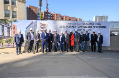 Brandywine Realty Trust, Drexel University, Gensler, INTECH Construction, and leaders from the Philadelphia community gather to celebrate the topping out of 3151 Market in Schuylkill Yards